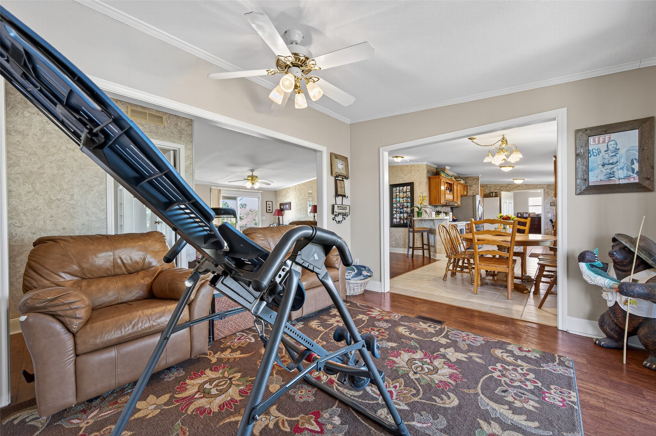 32445 Knebel Road Waller, TX 77484 - Photo 31 of 49 a work room with furniture and wooden floor