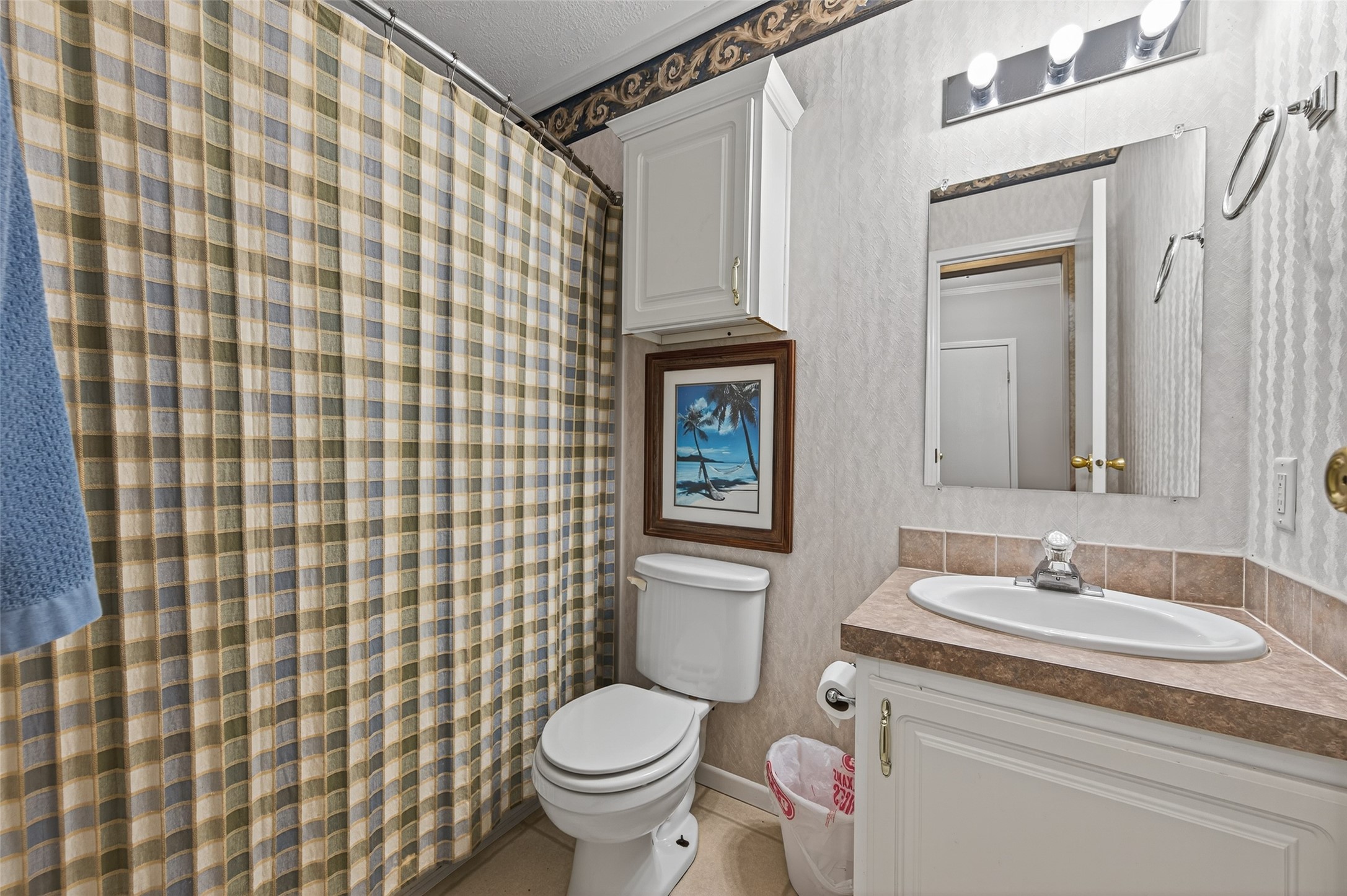 32445 Knebel Road Waller, TX 77484 - Photo 33 of 49 a bathroom with a sink toilet and shower