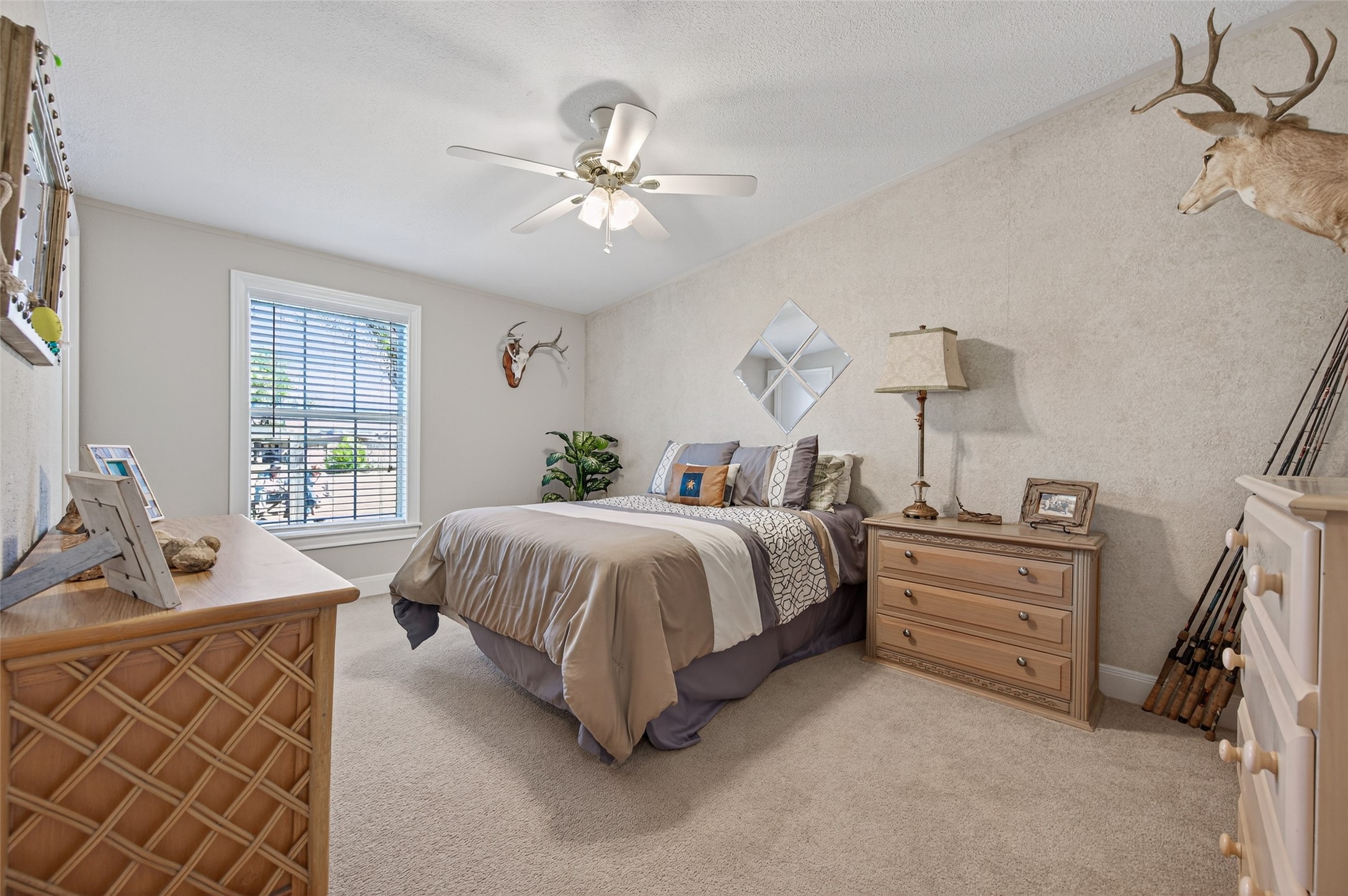 32445 Knebel Road Waller, TX 77484 - Photo 35 of 49 a spacious bedroom with a bed and window