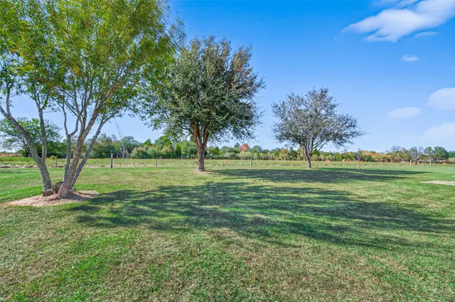 a view of parking garage with cars and other equipment