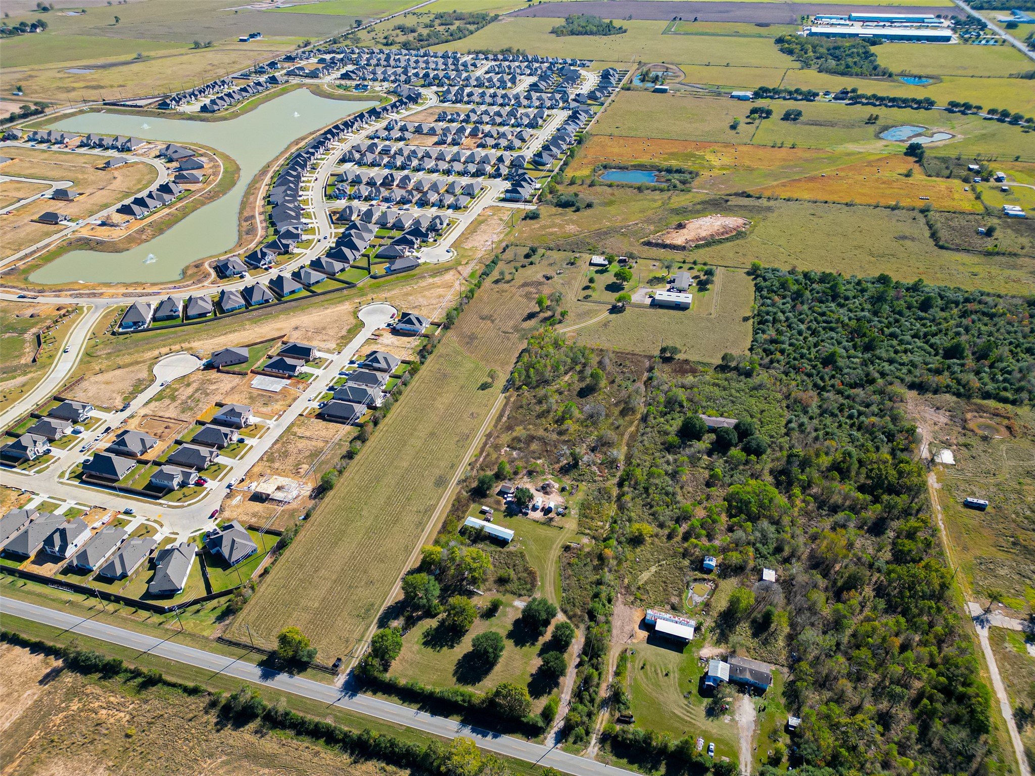 32445 Knebel Road Waller, TX 77484 - Photo 6 of 49 an aerial view of residential houses with outdoor space