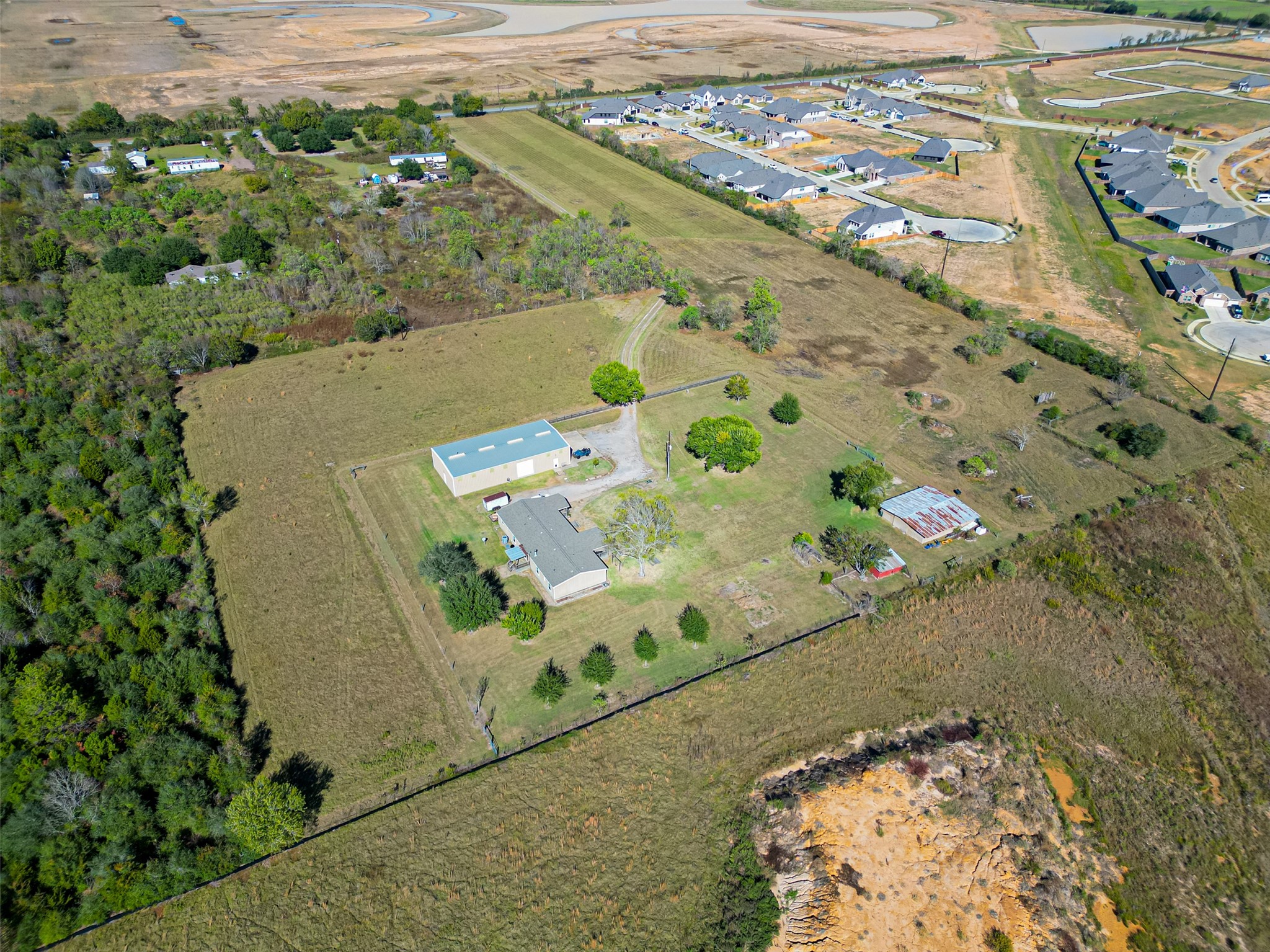 32445 Knebel Road Waller, TX 77484 - Photo 8 of 49 an aerial view of residential houses with outdoor space