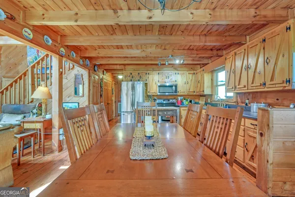 a living room with couch and a fireplace