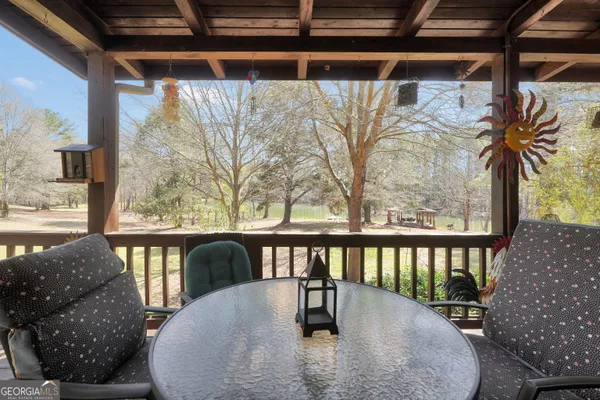 a bedroom with a bed and a book shelf