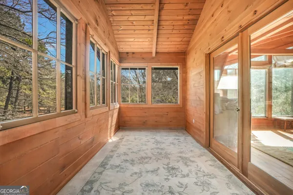 a bathroom with a double vanity sink toilet and shower