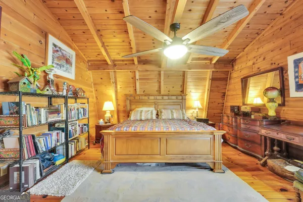 a bathroom with a sink and a large mirror