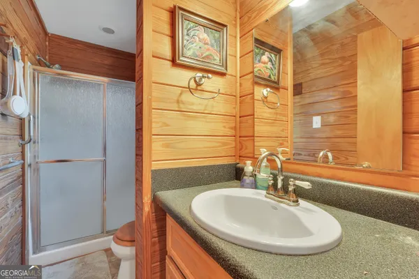 a view of an ocean with a mountain in the background