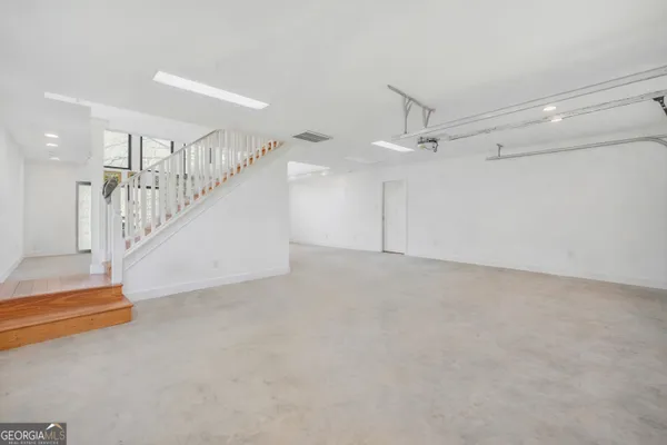 a view of a lake with a yard