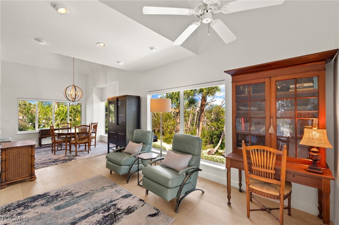 2400 Los Colony Road Sanibel, FL 33957 - Photo 13 of 50 a living room with furniture and a large window