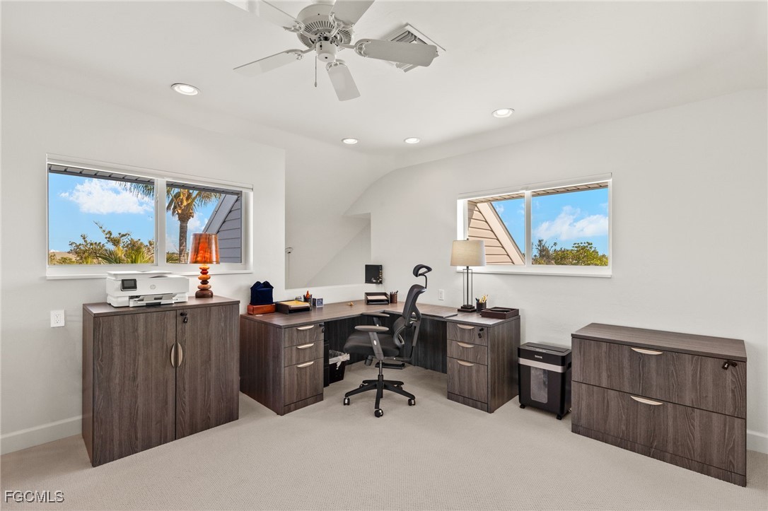 2400 Los Colony Road Sanibel, FL 33957 - Photo 30 of 50 a view of a workspace with furniture