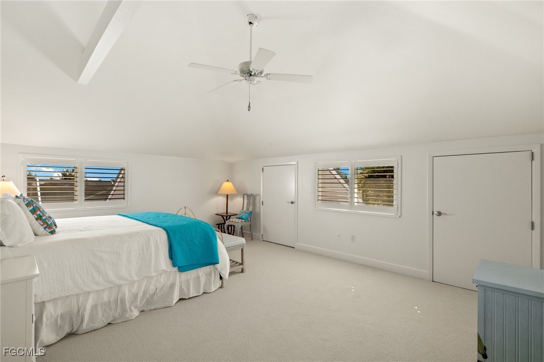 2400 Los Colony Road Sanibel, FL 33957 - Photo 33 of 50 a bedroom with a bed and a window