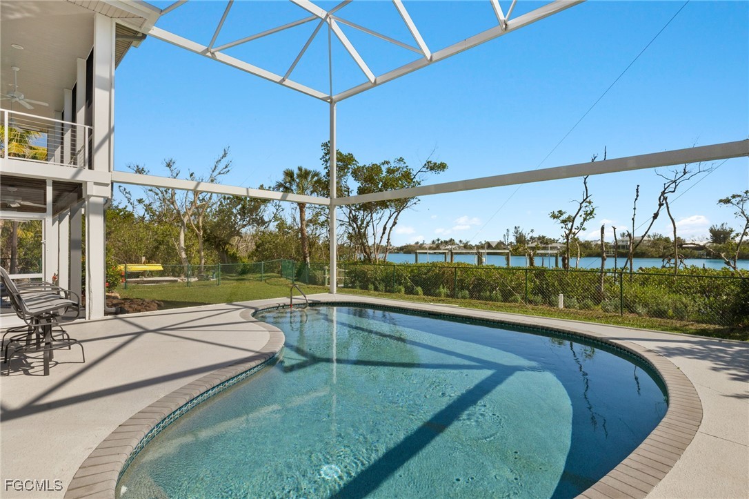 2400 Los Colony Road Sanibel, FL 33957 - Photo 37 of 50 a view of a swimming pool with a patio