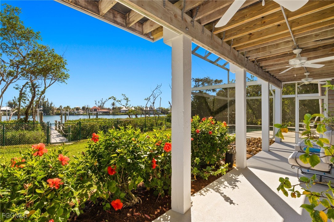 2400 Los Colony Road Sanibel, FL 33957 - Photo 38 of 50 a view of a chairs and table in a patio