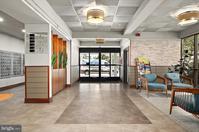 a swimming pool with outdoor seating and yard