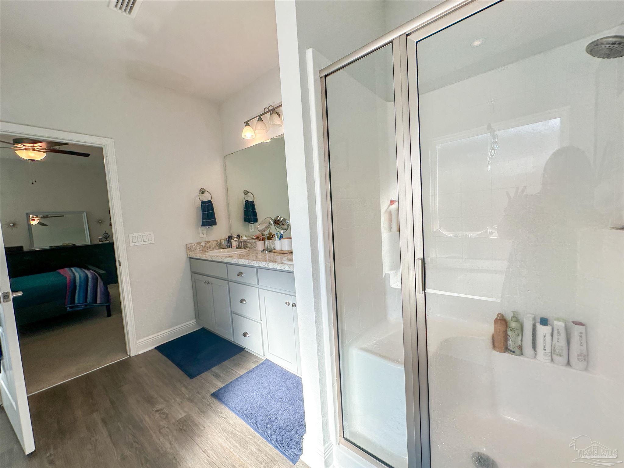 3613 Conley Drive Cantonment, FL 32533 - Photo 15 of 23 a bathroom with a sink and a mirror