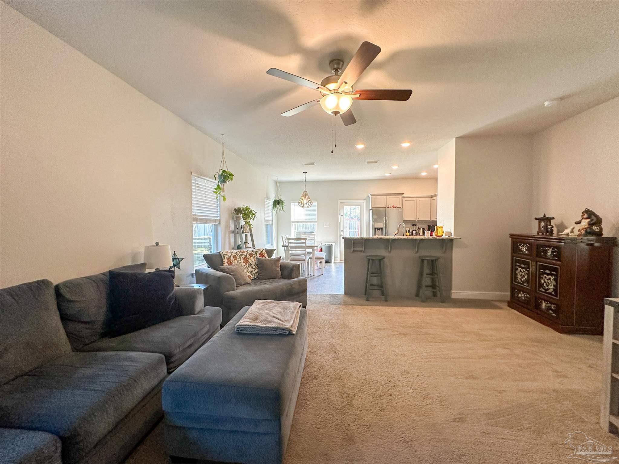 3613 Conley Drive Cantonment, FL 32533 - Photo 19 of 23 a living room with furniture and kitchen view