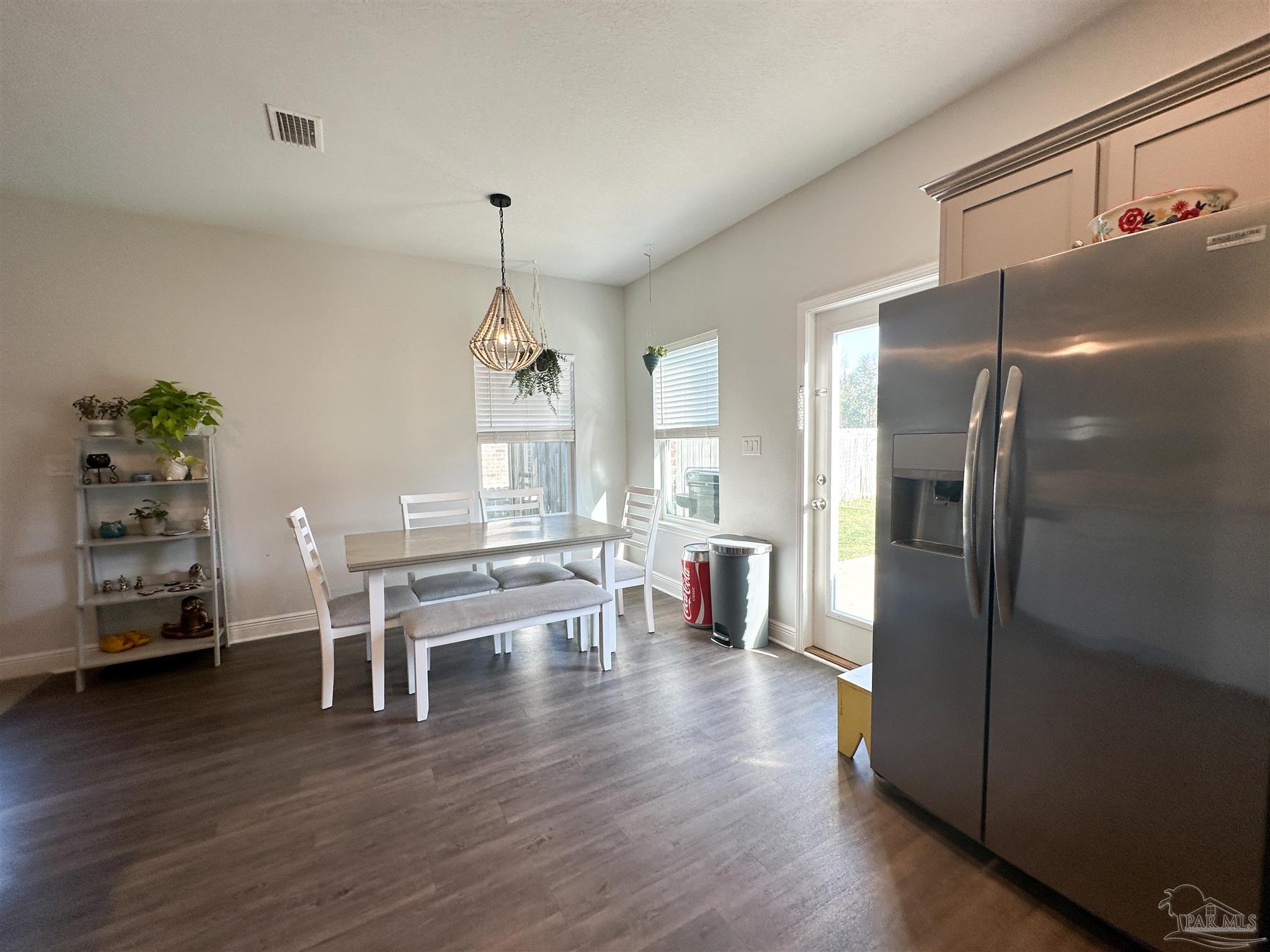 3613 Conley Drive Cantonment, FL 32533 - Photo 22 of 23 a living room with furniture and a wooden floor