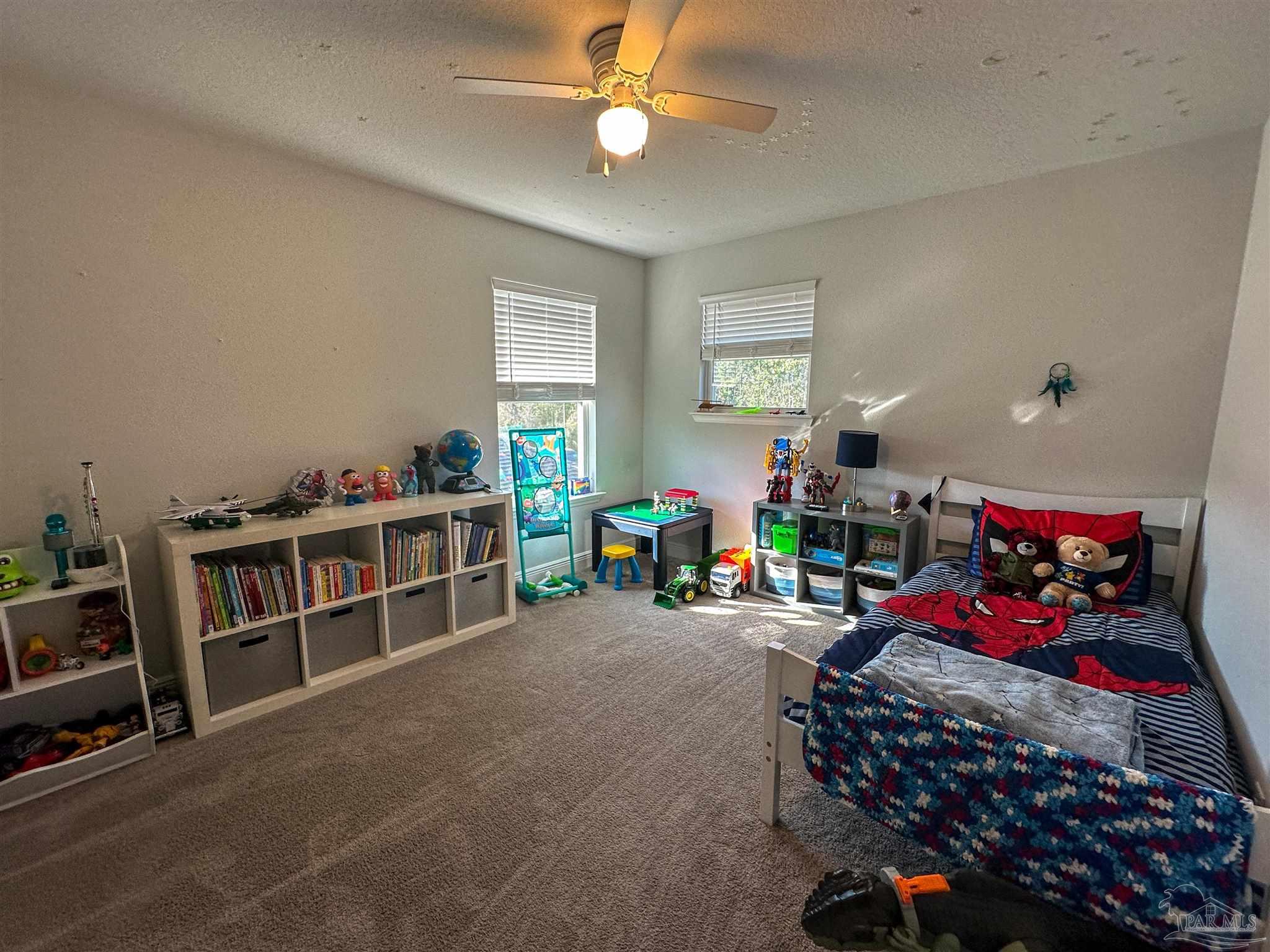 3613 Conley Drive Cantonment, FL 32533 - Photo 6 of 23 a bedroom with furniture a air conditioner vent and a window