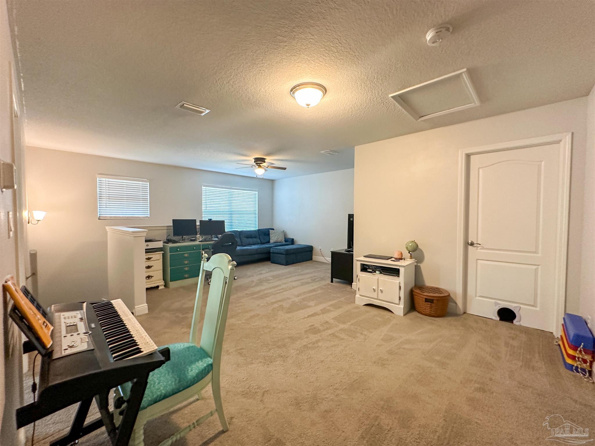 3613 Conley Drive Cantonment, FL 32533 - Photo 9 of 23 a living room with furniture and a window