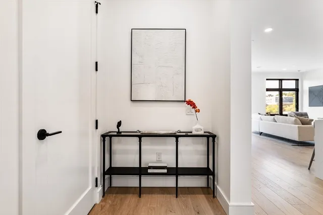 a view of a room with a table and a chair
