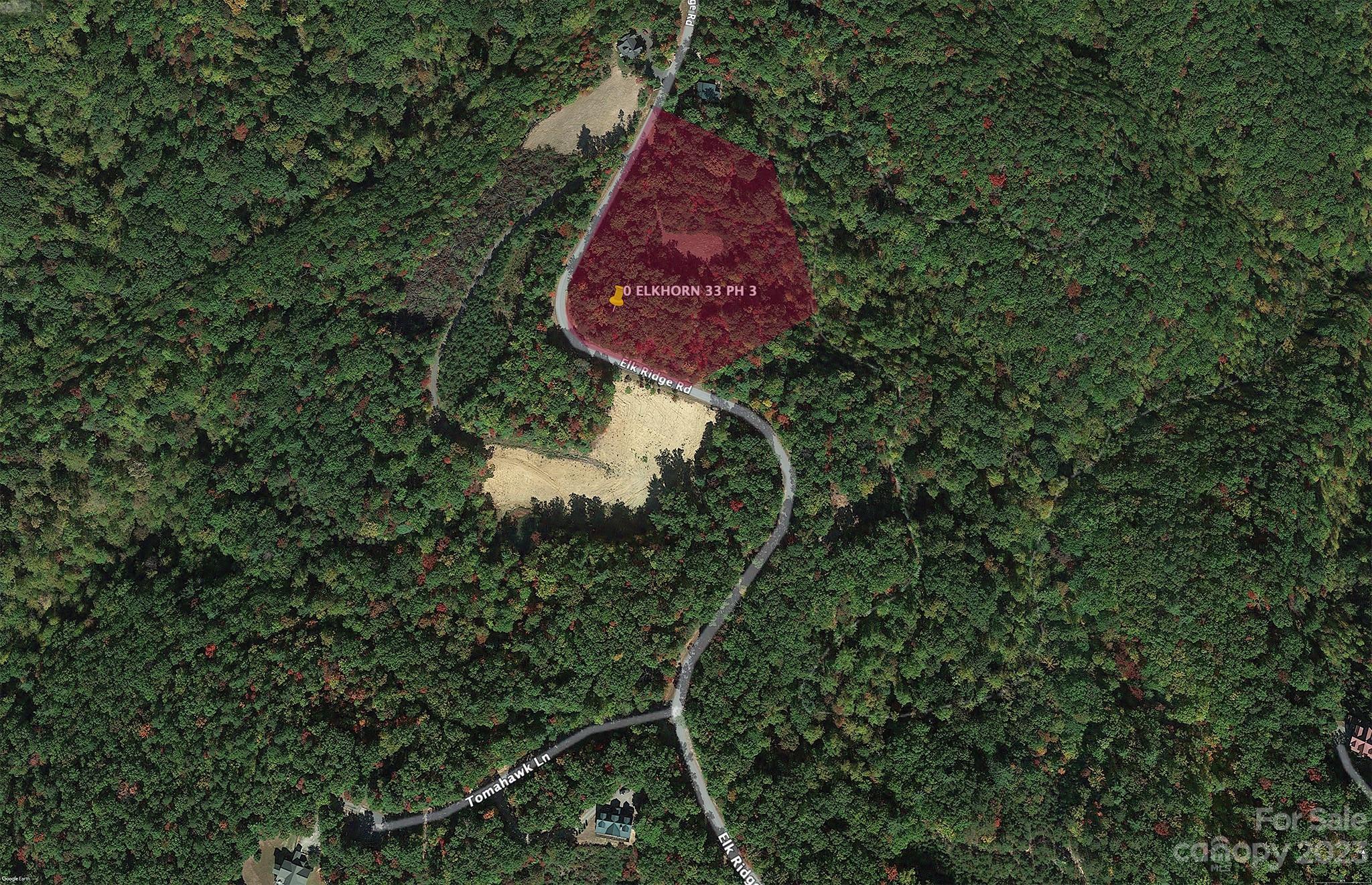 3675 Elk Ridge Road Ferguson, NC 28624 - Photo 4 of 12 an aerial view of a house with a yard