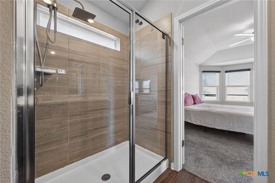 1036 View Drive Georgetown, TX 78628 - Photo 14 of 33 a en suite bathroom with a shower