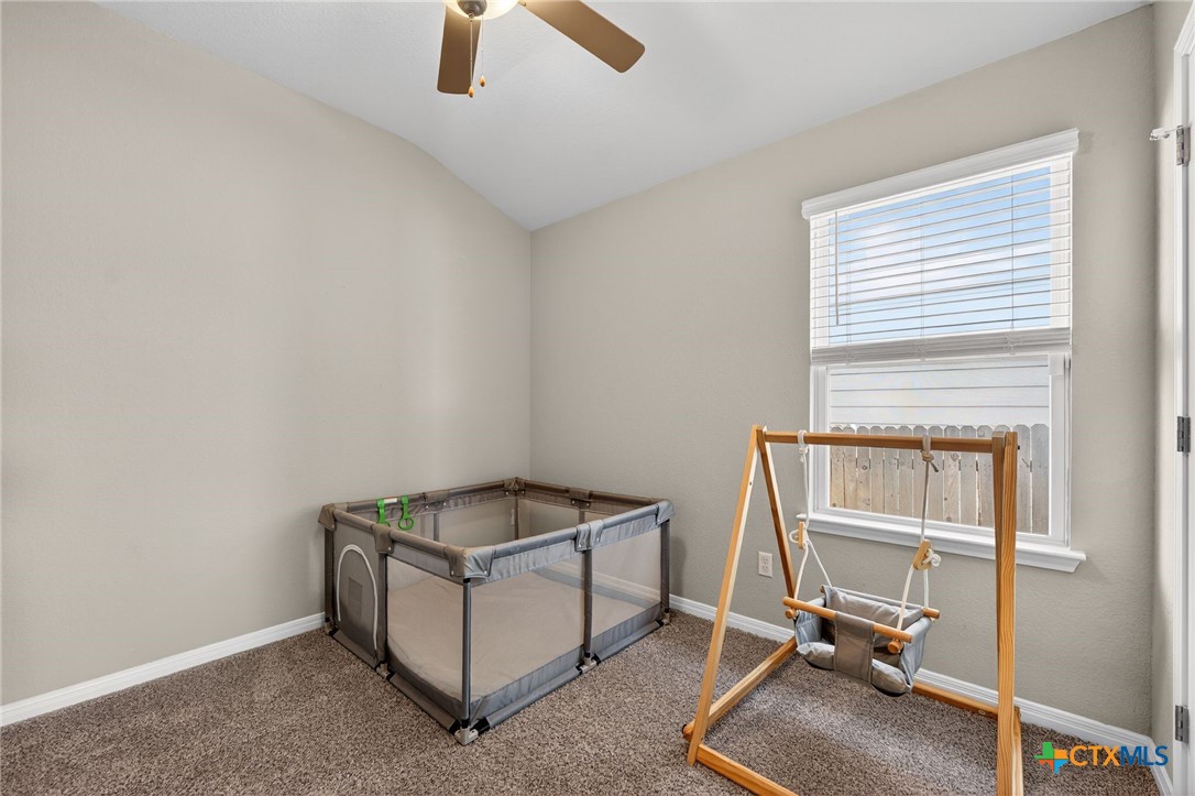 1036 View Drive Georgetown, TX 78628 - Photo 22 of 33 a room with gym equipment and a window
