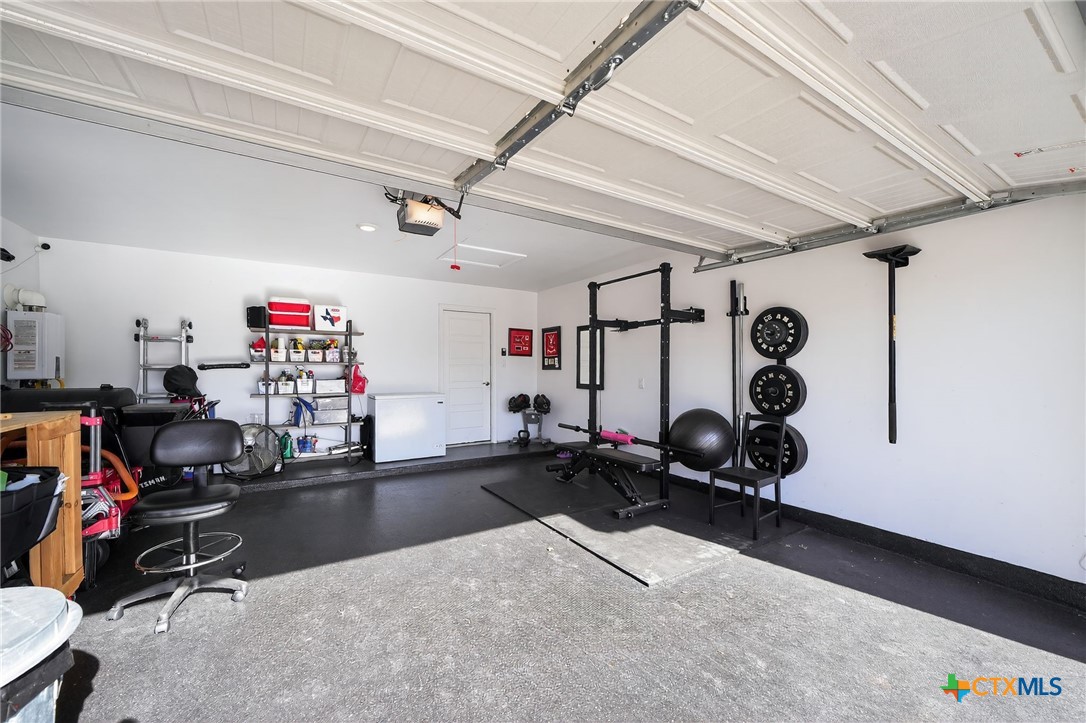 1036 View Drive Georgetown, TX 78628 - Photo 26 of 33 a view of a room with gym equipment