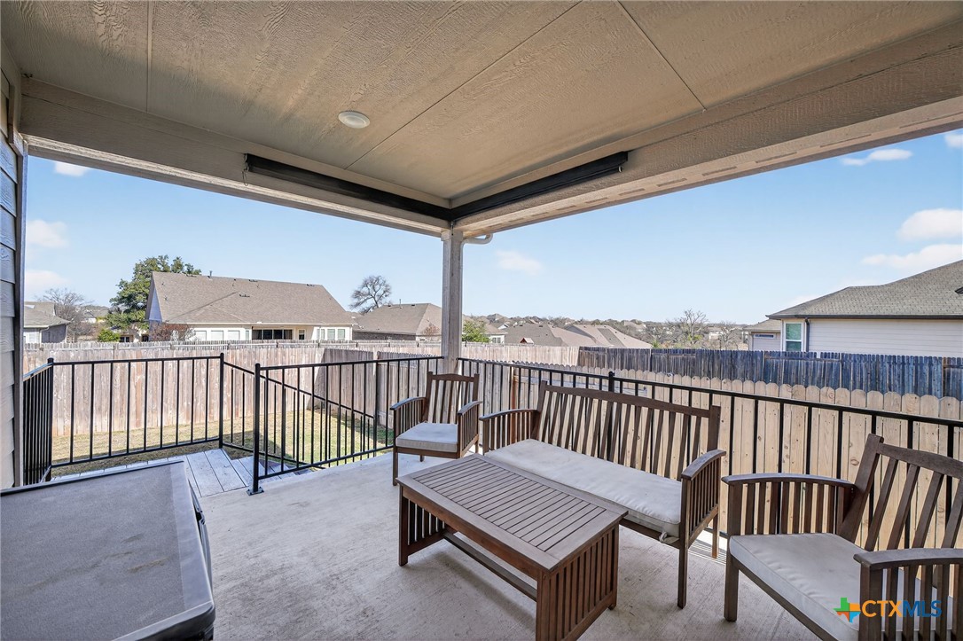 1036 View Drive Georgetown, TX 78628 - Photo 27 of 33 a view of a balcony with furniture