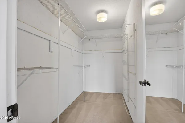 a view of a room with white walls