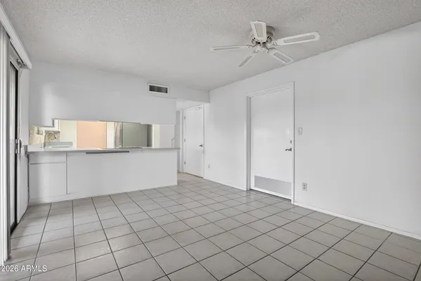 a view of an empty room and window