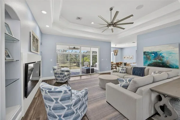 a kitchen with stainless steel appliances a refrigerator sink and cabinets