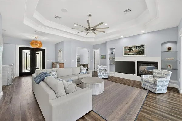 a kitchen with a sink stove and microwave