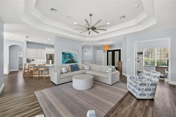 a kitchen with a sink stainless steel appliances and cabinets
