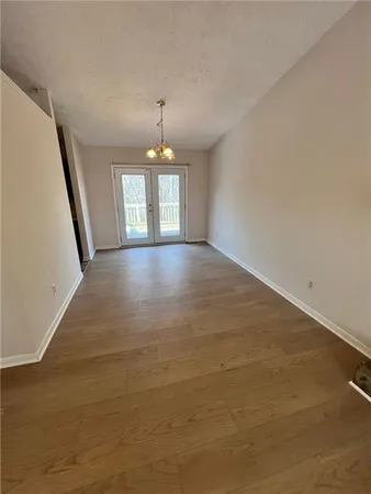 a kitchen with a sink a stove and a refrigerator