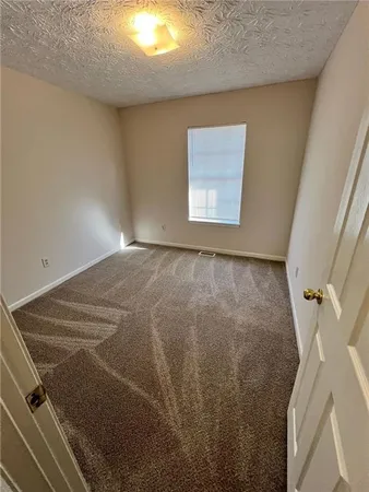 an empty room with a door