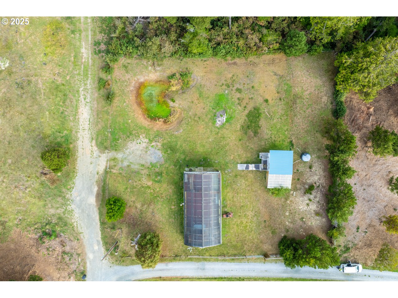 87905 Astor Lane Bandon, OR 97411 - Photo 1 of 26 a view of a lake view