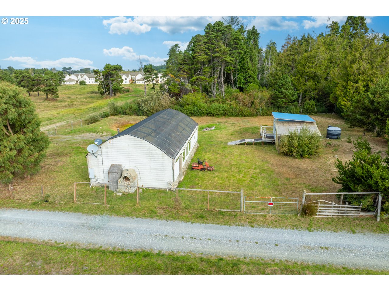 87905 Astor Lane Bandon, OR 97411 - Photo 3 of 26 an aerial view of a house