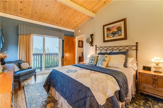 a bed room with a bed and a window