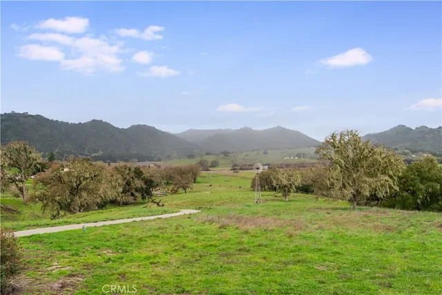 a view of lake with mountain
