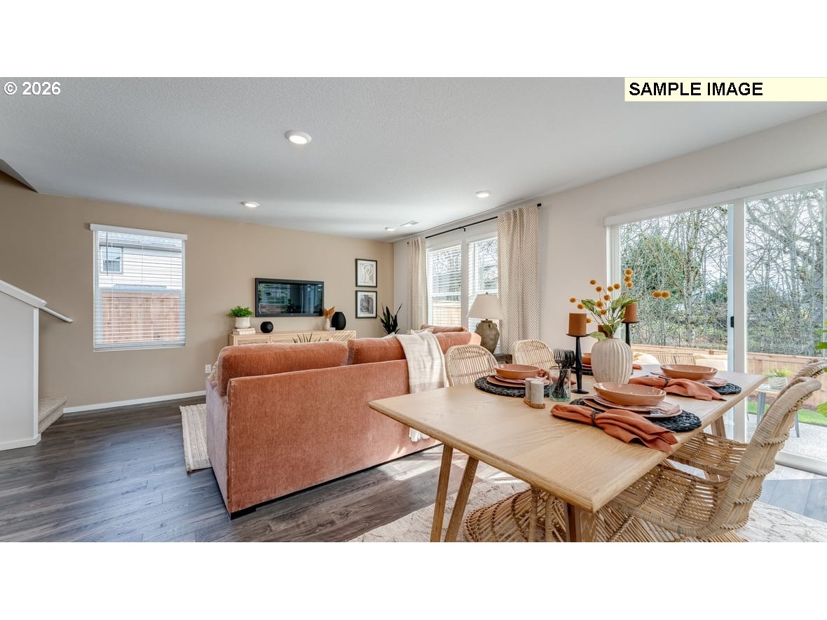 105 Coho Loop Woodland, WA 98674 - Photo 10 of 27 a living room with furniture window and wooden floor