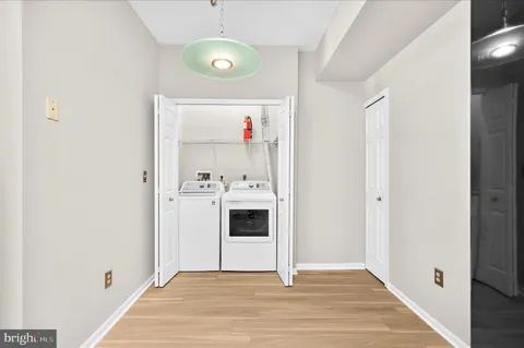 a view of utility room and closet