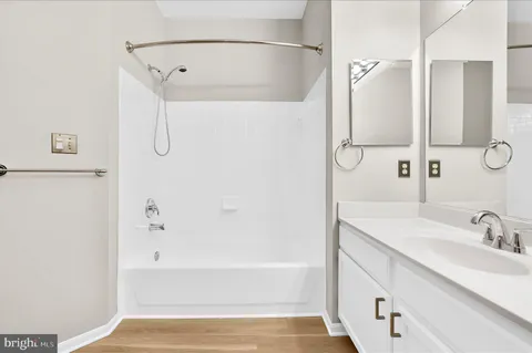 a bathroom with a sink and a bathtub