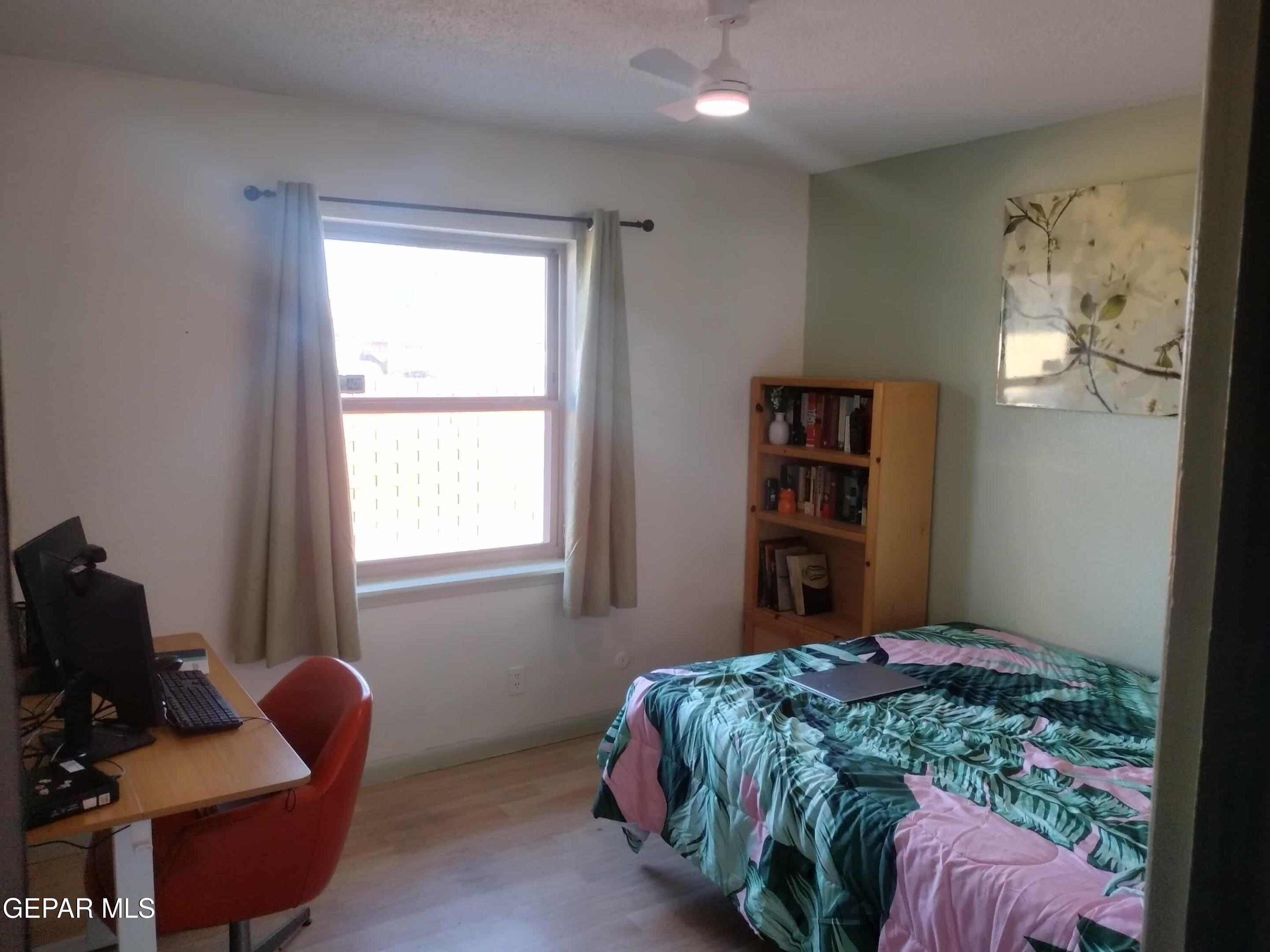 3307 Donegal Road El Paso, TX 79925 - Photo 14 of 21 a bedroom with bed and a window