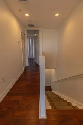 a view of hallway with stairs