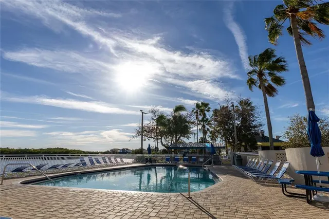 a view of a park with large trees