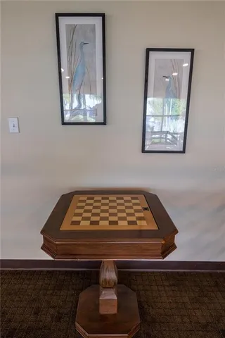 a dining room with furniture water view and balcony