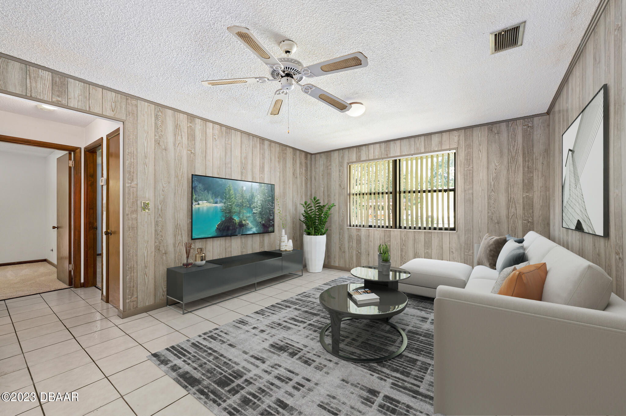 221 Putnam Avenue Ormond Beach, FL 32174 - Photo 30 of 63 Family room staged photo