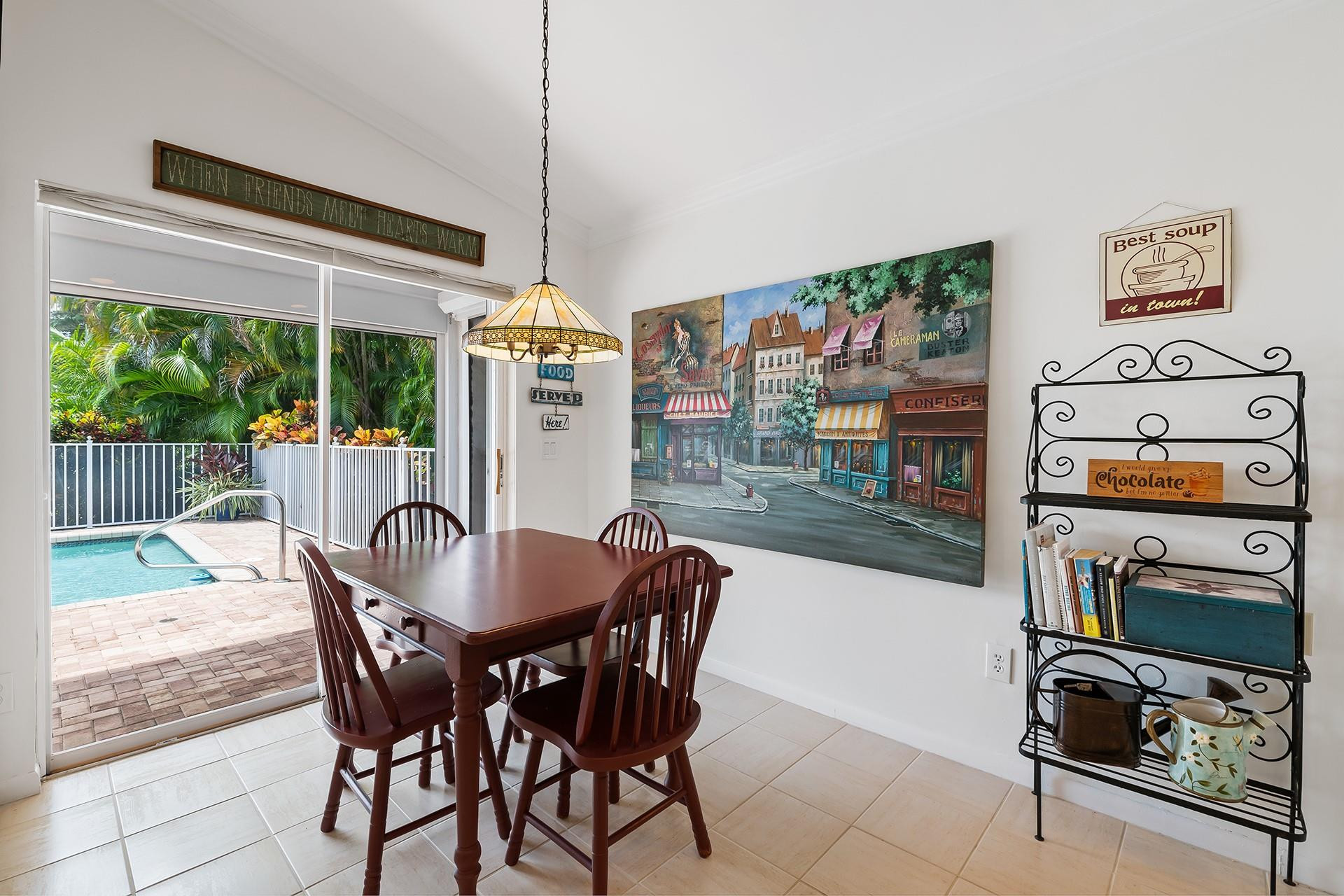 10344 Sunset Bend Drive Boca Raton, FL 33428 - Photo 14 of 32 a dining room with furniture and window