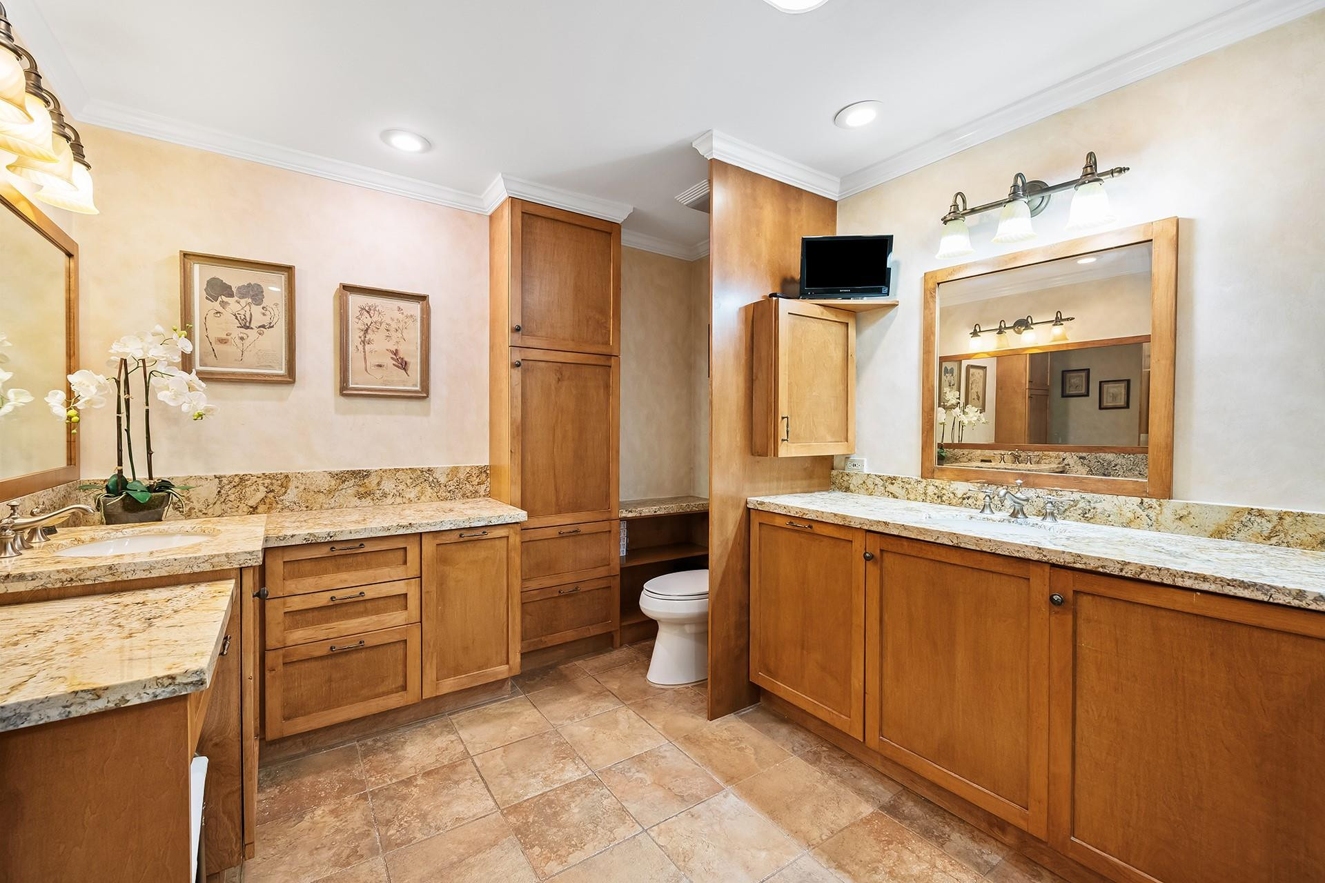 10344 Sunset Bend Drive Boca Raton, FL 33428 - Photo 17 of 32 a bathroom with a granite countertop sink toilet and shower